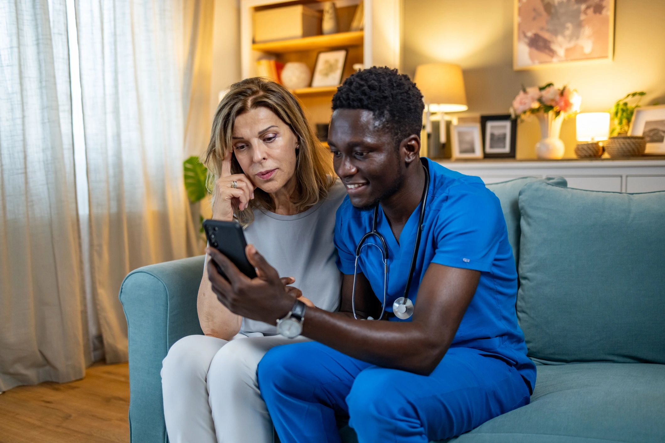 primary care doctor with patient, home visit, telehealth, mental health, diagnostic testing